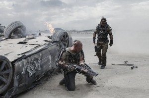 Matt Damon (left) and Sharlto Copley in Columbia Pictures' ELYSIUM.