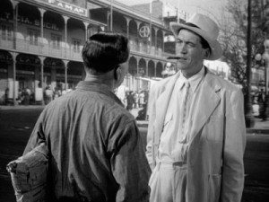 John Huston in his fancy white suit