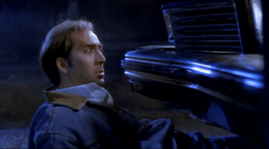 Cage stops a car with the power of his stare