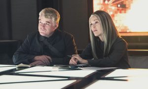 hunger-games-mockingjay-julianne-moore-philip-seymour-hoffman-get-your-first-look-at-president-coin-in-the-hunger-games-mockingjay-part