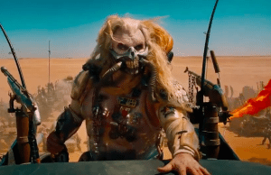 Immortan Joe cracks a smile... I think?